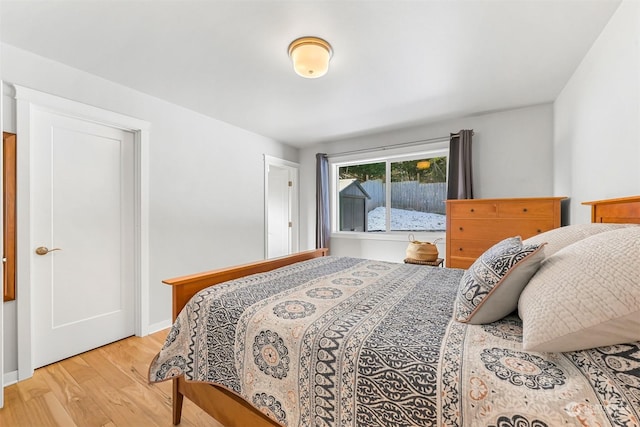 bedroom with light wood-type flooring