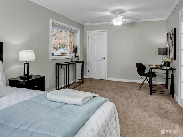 carpeted bedroom featuring ceiling fan and ornamental molding