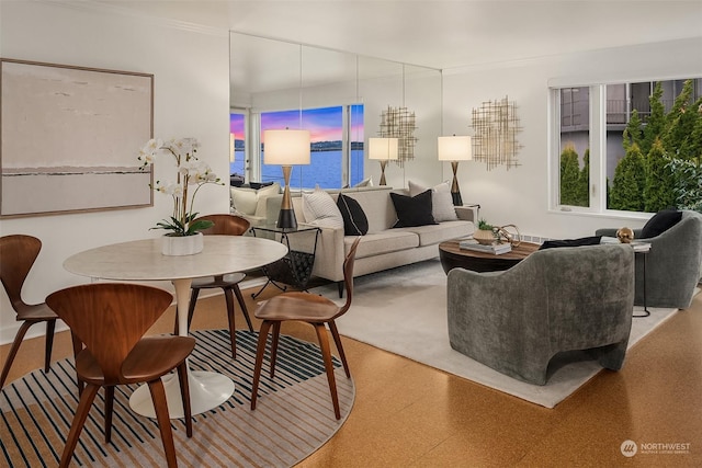 1600 43rd Ave E Unit 204, Seattle, WA 98112 - living room with crown molding and a water view