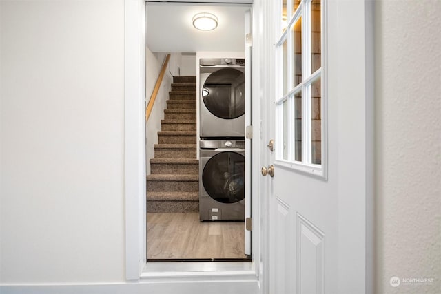 laundry room featuring stacked washer and dryer