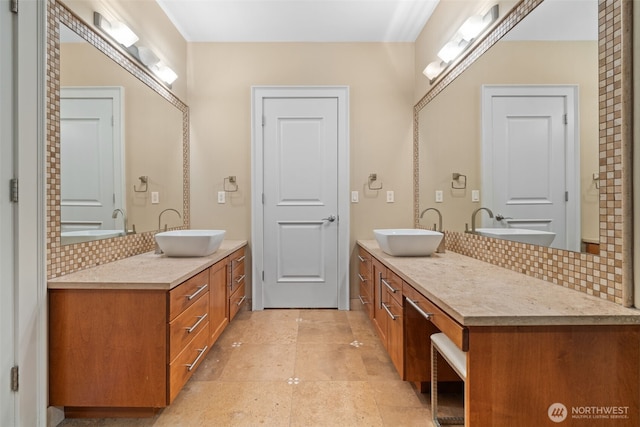 bathroom featuring backsplash and vanity