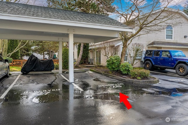 view of car parking with a carport