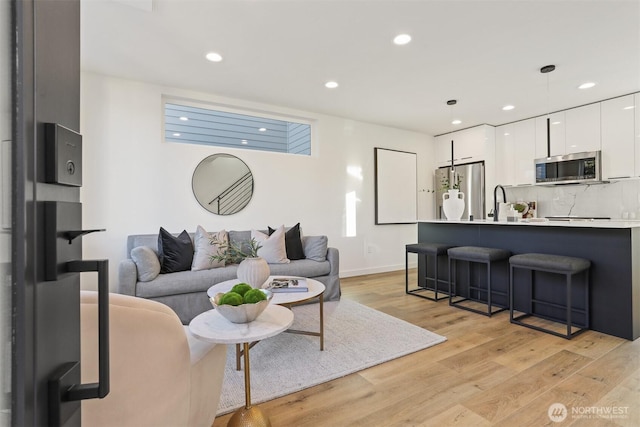 living room featuring light hardwood / wood-style flooring