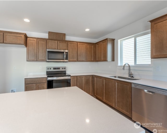 kitchen featuring stainless steel appliances and sink