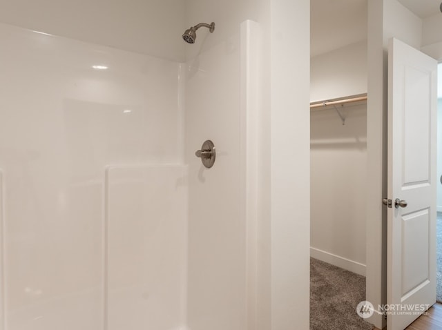 bathroom featuring walk in shower