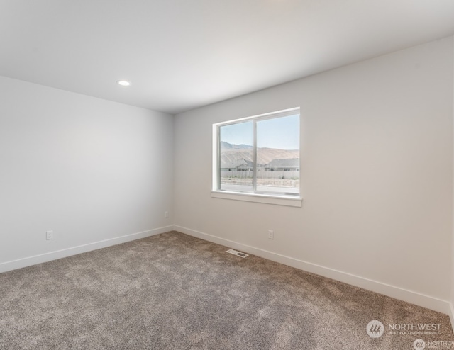 view of carpeted empty room