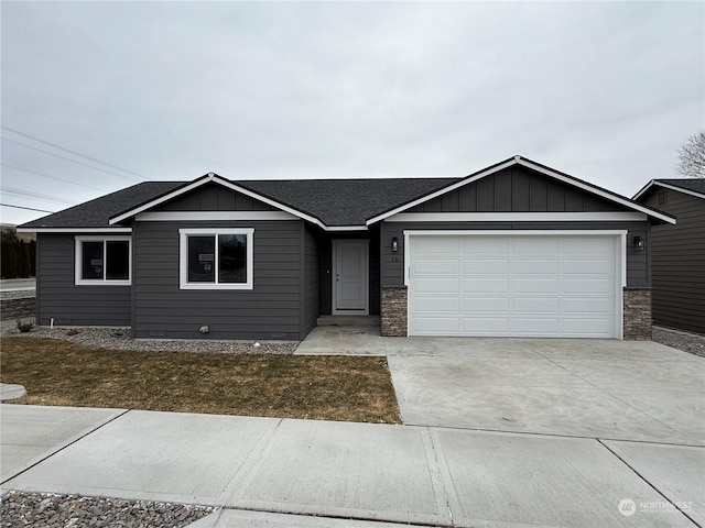 ranch-style house featuring a garage