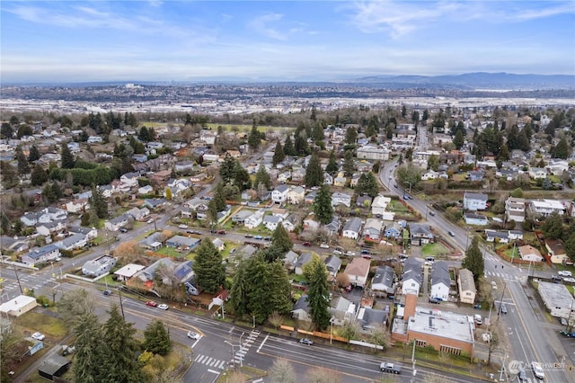 drone / aerial view featuring a mountain view