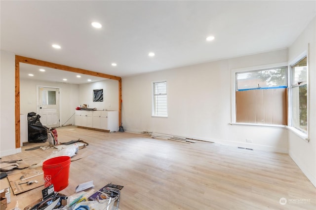 living room with light hardwood / wood-style flooring