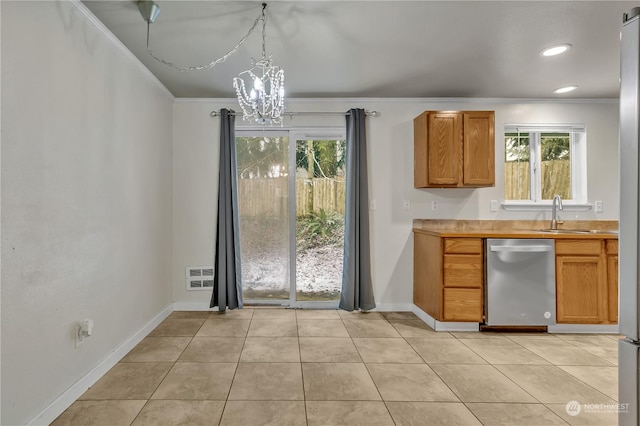 kitchen with sink, crown molding, dishwasher, hanging light fixtures, and light tile patterned flooring