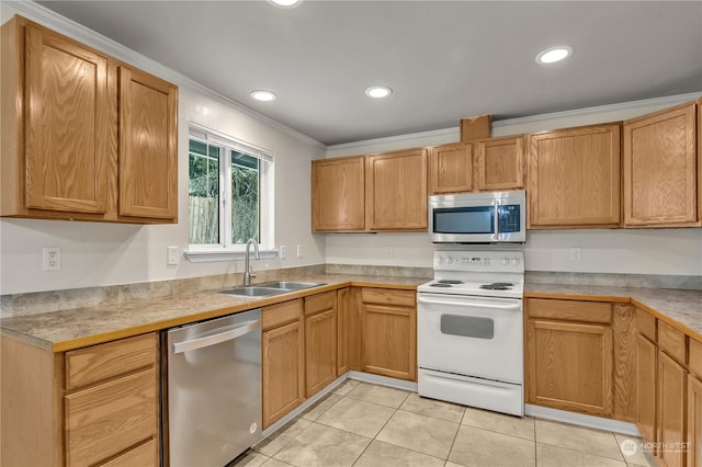 kitchen with light tile patterned flooring, ornamental molding, stainless steel appliances, and sink