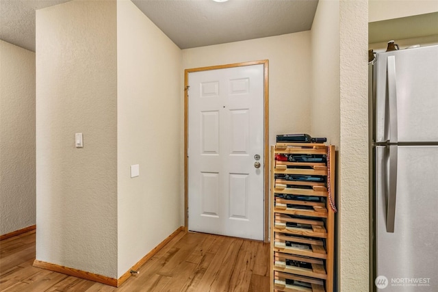 interior space with light hardwood / wood-style floors