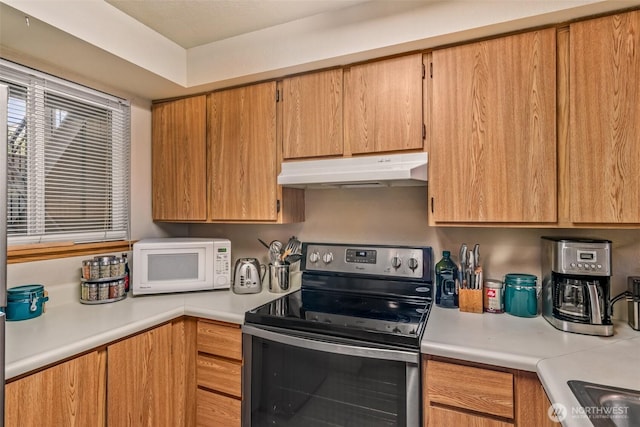 kitchen with stainless steel electric range oven