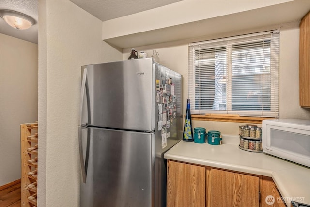 kitchen with stainless steel fridge