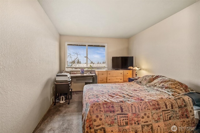 bedroom featuring carpet