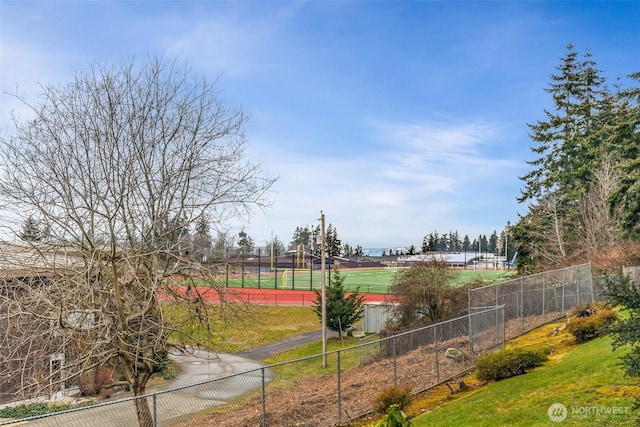 exterior space featuring tennis court