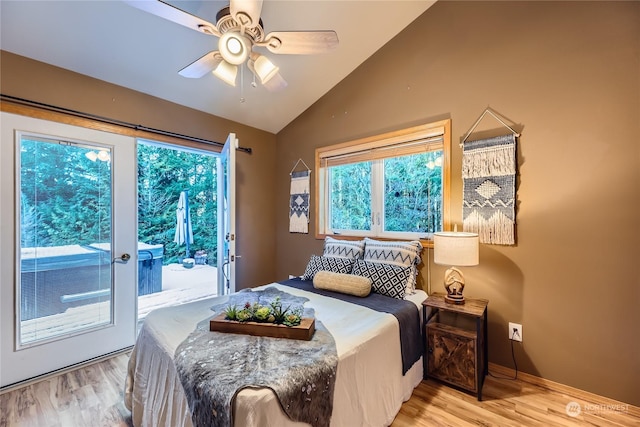 bedroom with vaulted ceiling, ceiling fan, access to exterior, and light wood-type flooring