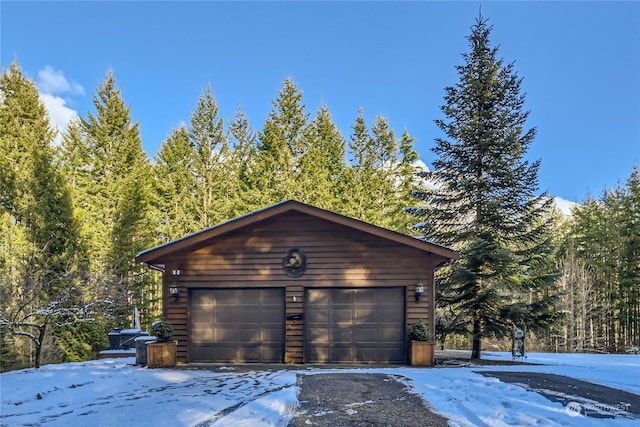 view of snow covered garage