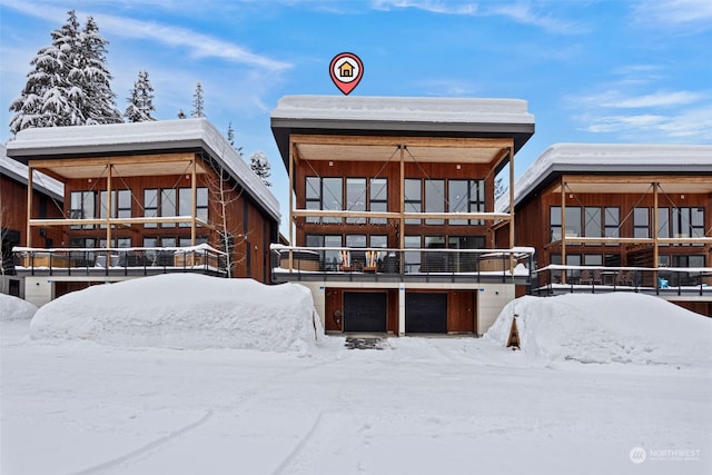 view of snow covered property