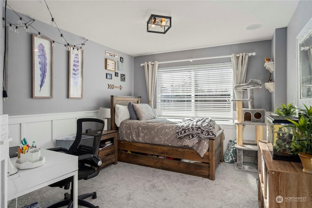 bedroom with light colored carpet