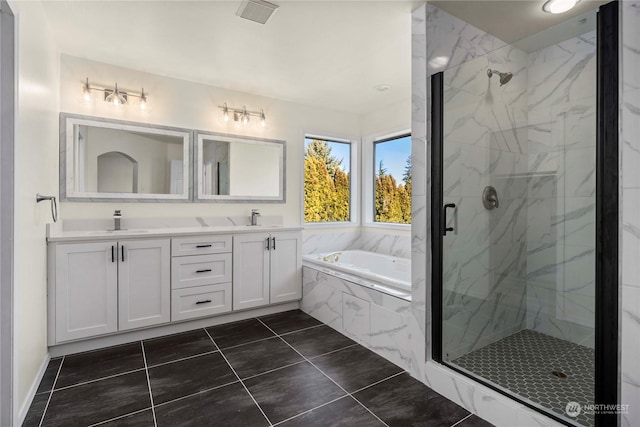 bathroom with plus walk in shower and vanity