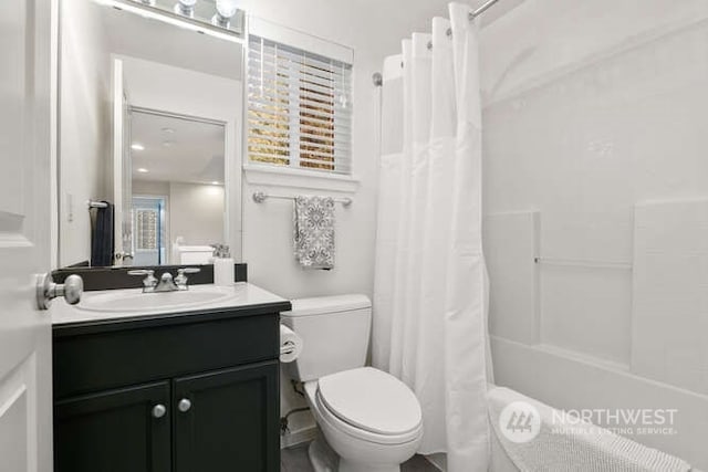 full bathroom with toilet, vanity, and shower / bathtub combination with curtain