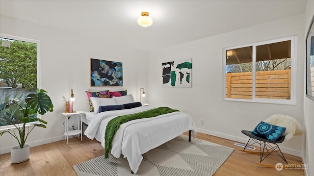 bedroom featuring light hardwood / wood-style floors