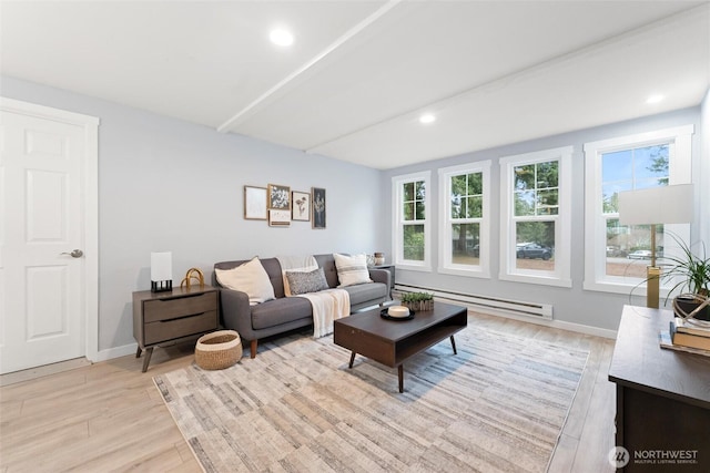 living room featuring light wood-type flooring, baseboards, baseboard heating, and recessed lighting