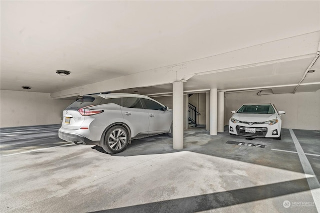 garage featuring a carport