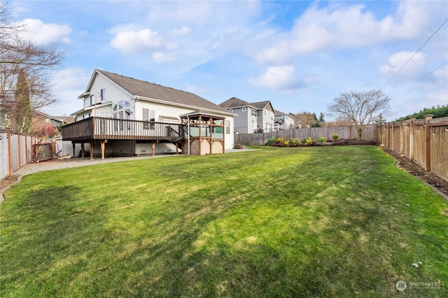 view of yard featuring a wooden deck and a gazebo