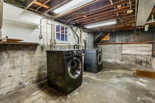 basement with separate washer and dryer