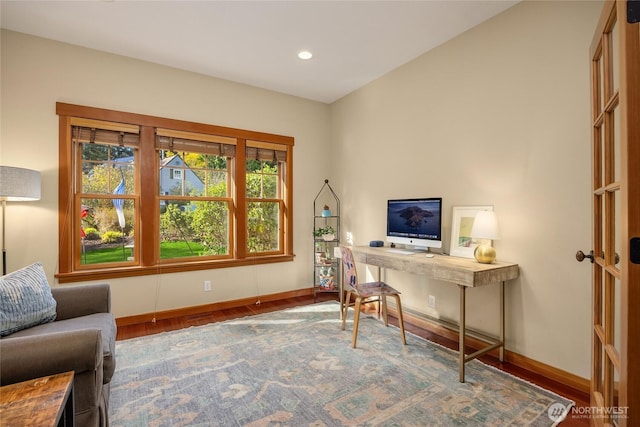 office area featuring baseboards, recessed lighting, and wood finished floors