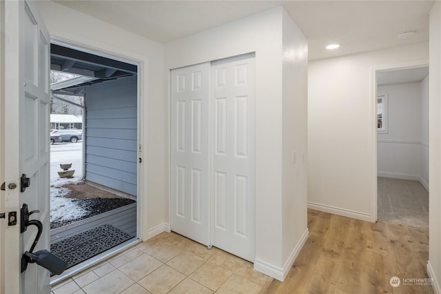 foyer entrance featuring light hardwood / wood-style flooring