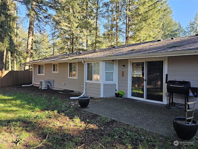 back of house with cooling unit