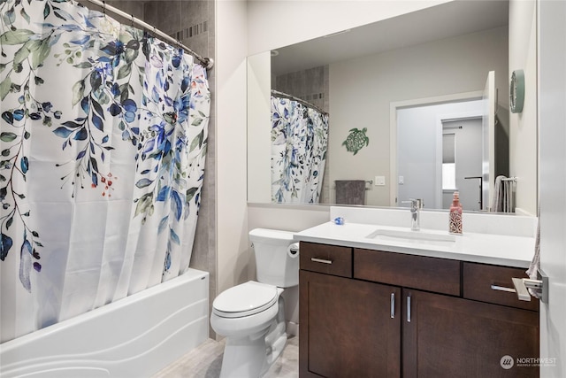 full bathroom with vanity, toilet, and shower / tub combo