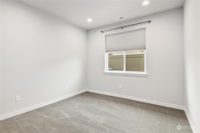 unfurnished room with carpet floors