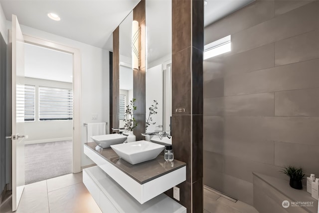 bathroom featuring tile patterned flooring and vanity