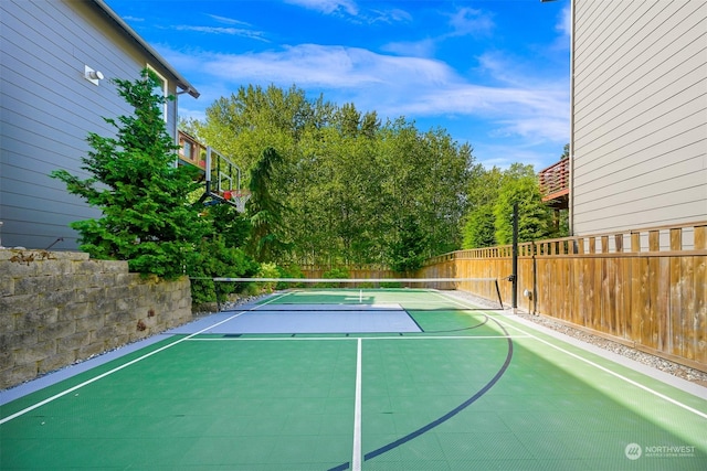 view of sport court with tennis court