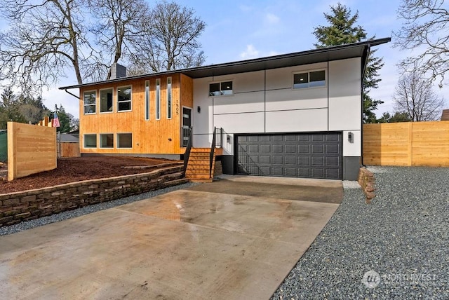 view of front of home with a garage