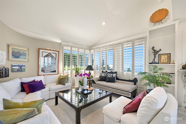 living room with vaulted ceiling