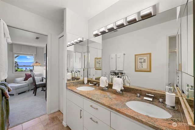 bathroom featuring vanity and tile patterned flooring