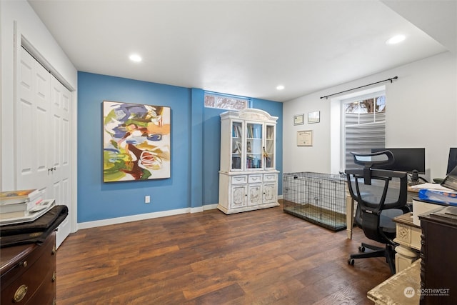 office featuring a healthy amount of sunlight and dark hardwood / wood-style floors