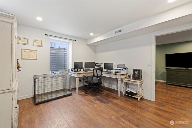 office space with hardwood / wood-style floors