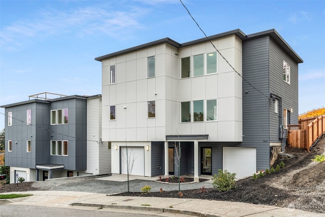 view of front of property featuring a garage