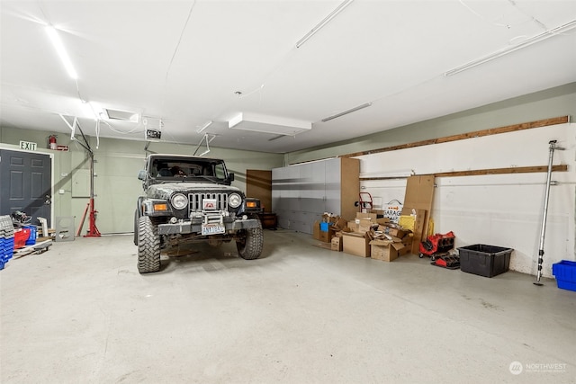 garage featuring a garage door opener