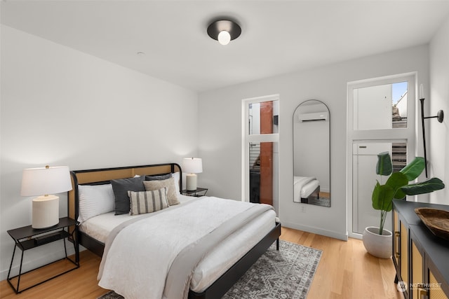 bedroom featuring light hardwood / wood-style floors