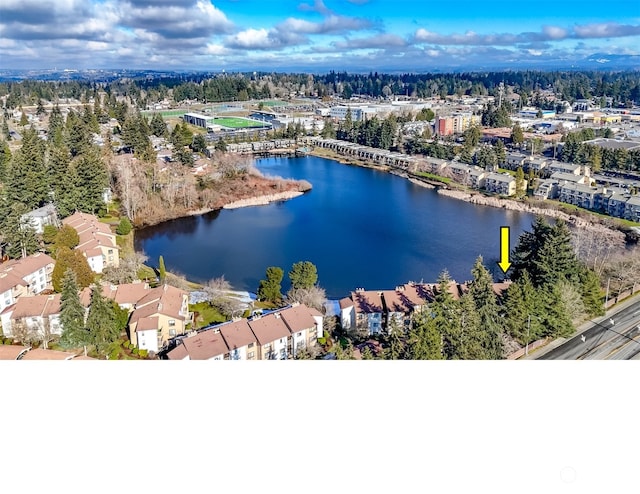 bird's eye view with a water view