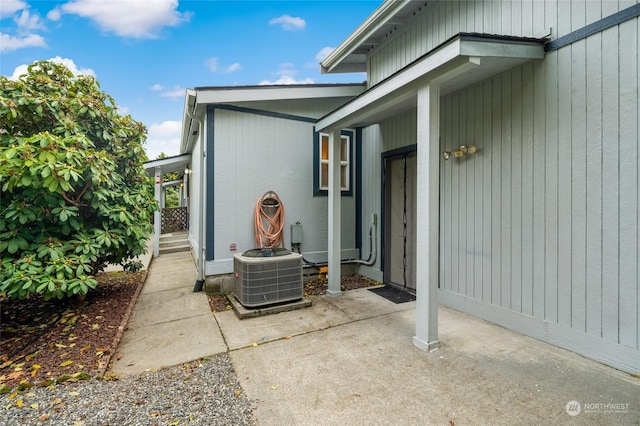 entrance to property featuring central AC and a patio area