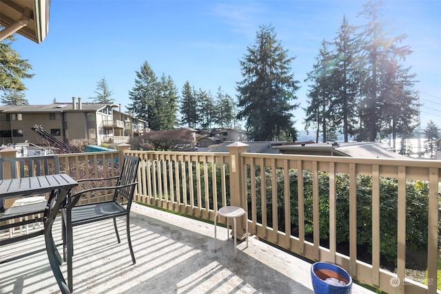 wooden balcony featuring a deck