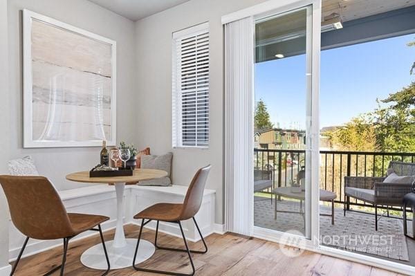 dining area featuring breakfast area and light hardwood / wood-style flooring